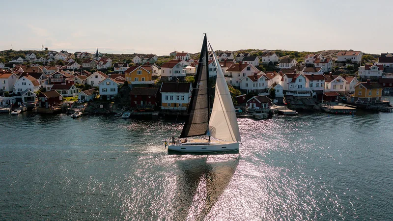 Arcona 50 sailing along the coast, drone view