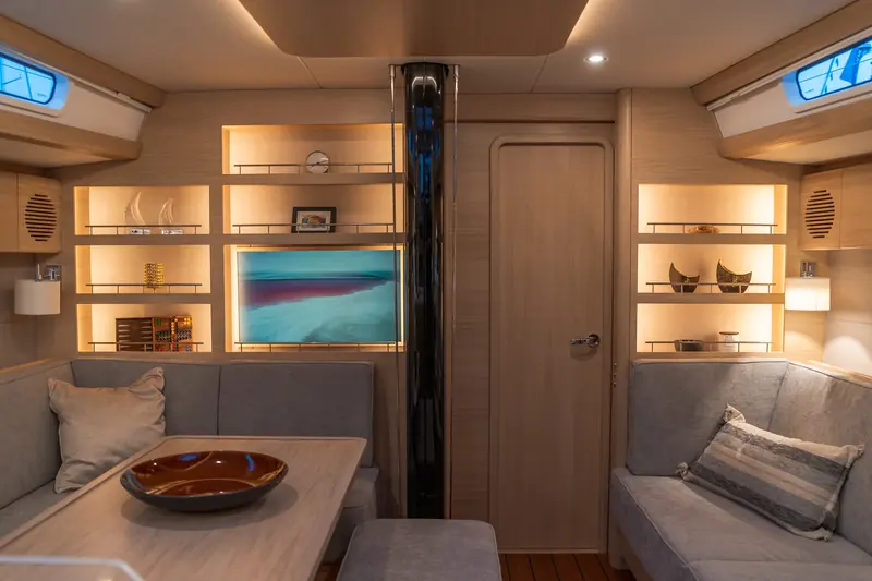 Arcona 50 main saloon with oak joinery and shelving