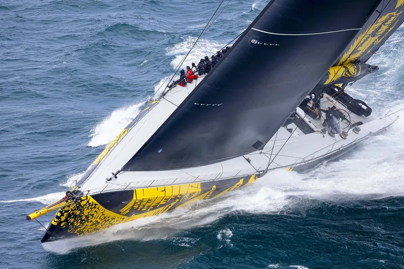 ClubSwan 125 Skorpios driving through a wave at the Rolex Fastnet Race