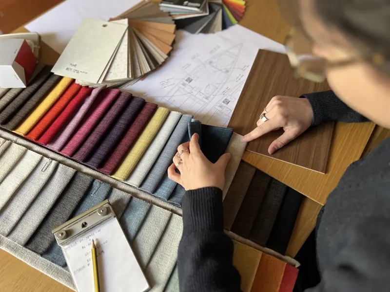 Selecting interior fabrics and veneers over a sail plan