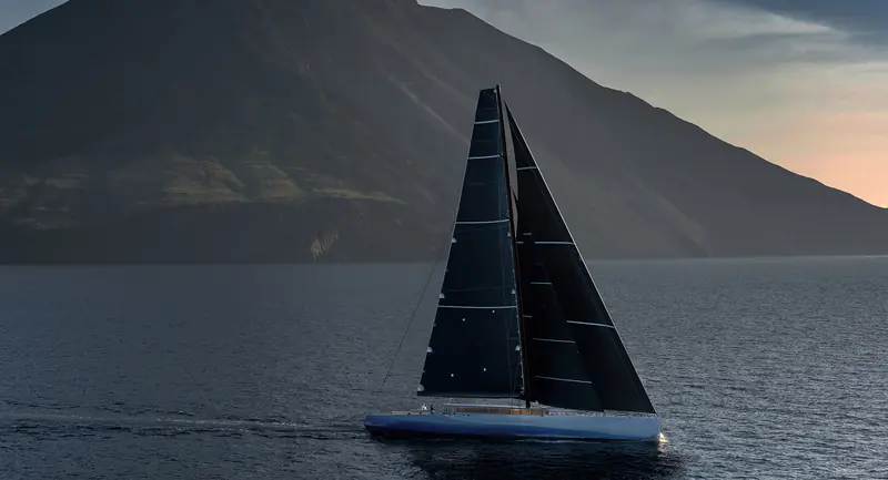 129-foot Yemaya under black sails at dusk